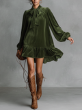 Sévanne – robe mini velours ample à col noué élégant